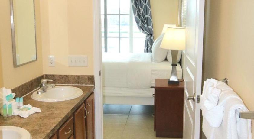 a bathroom with a sink, toilet, and bathtub, John's Pass Hotel - Brand New Property Fully Remote in Madeira Beach (FL)