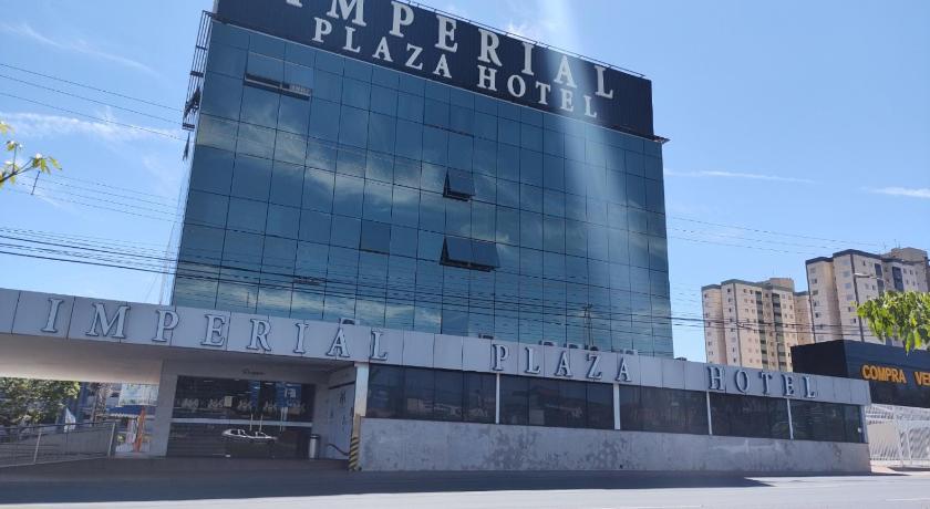 a large building with a sign on the side of it, Imperial Plaza Hotel in Brasilia
