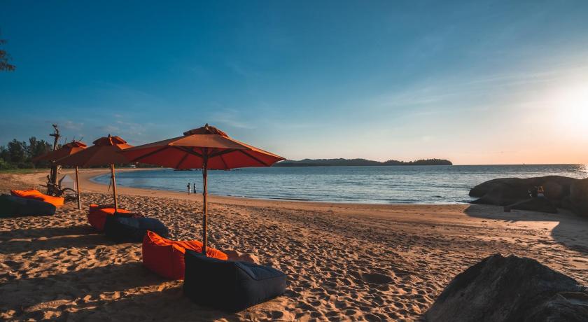a beach with umbrellas on the sand, Kalima Resort and Villas Khao Lak (SHA Extra plus) in Khao Lak