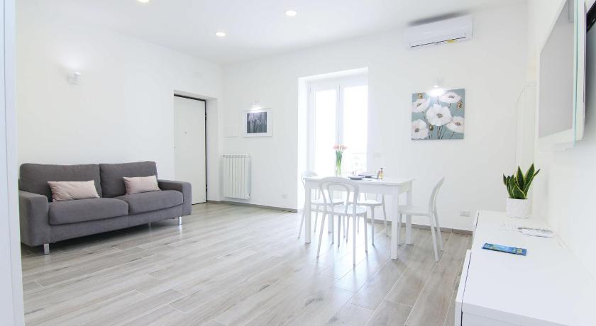 FOUR WHITE APARTMENTS