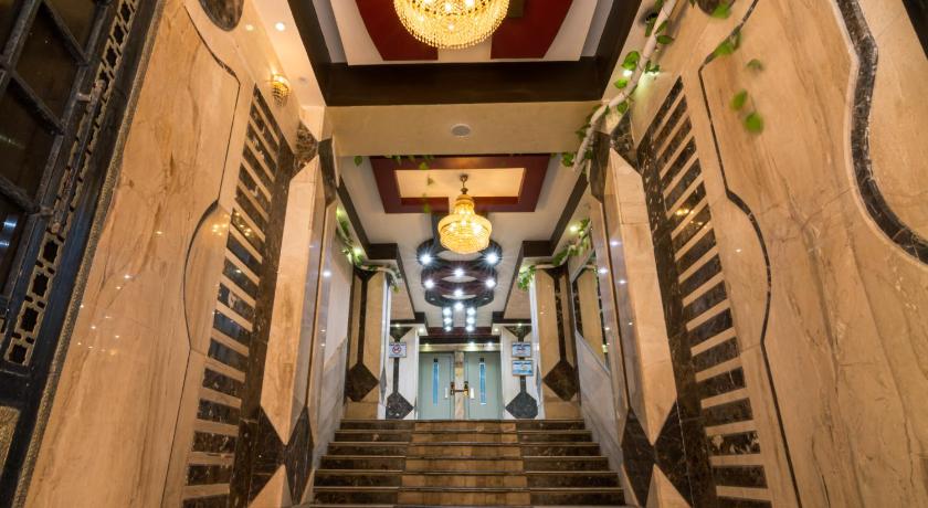a stairway leading up to a large room, Almanara Hotel Marsa Matrouh in Marsa Matruh