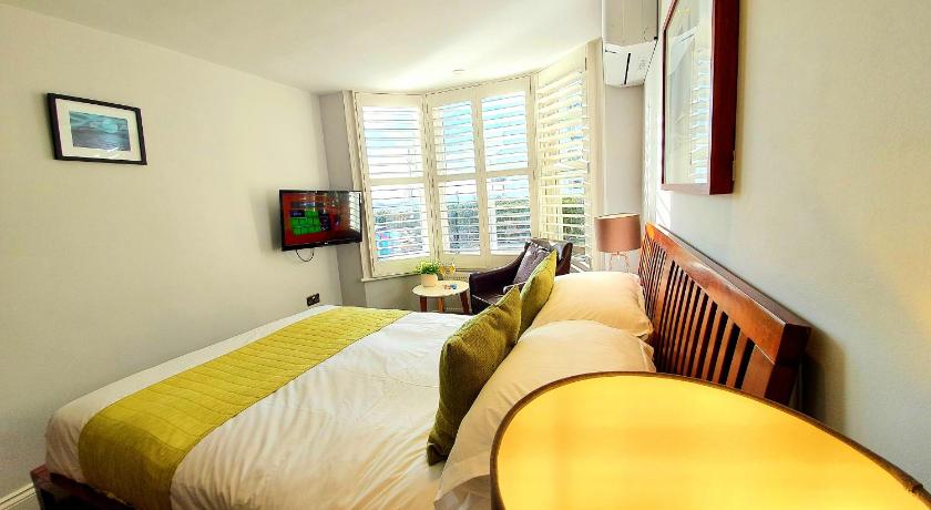 Image of Double Room - Ground Floor with Sea View 0