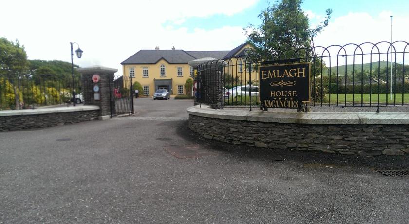 a road with a sign on the side of it, Emlagh House in Dingle