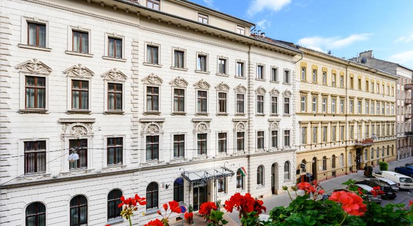 a large building with a lot of windows in front of it, Bristol Hotel Budapest in Budapest