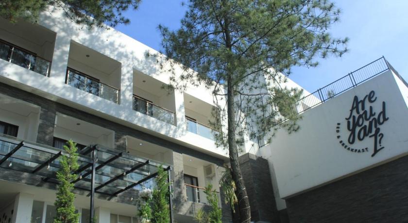 a large building with a large window, Are You And I Bed and Breakfast in Bandung