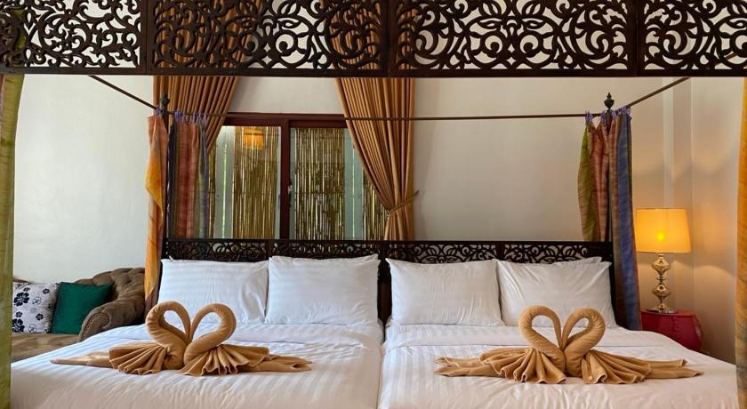 รูปของห้องสำหรับครอบครัวพร้อมวิวสวน (Family Room with Garden View) 6