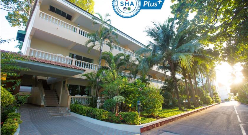 a large building with a sign on the side of it, Twin Palms Resort Pattaya (SHA Extra Plus) in Pattaya