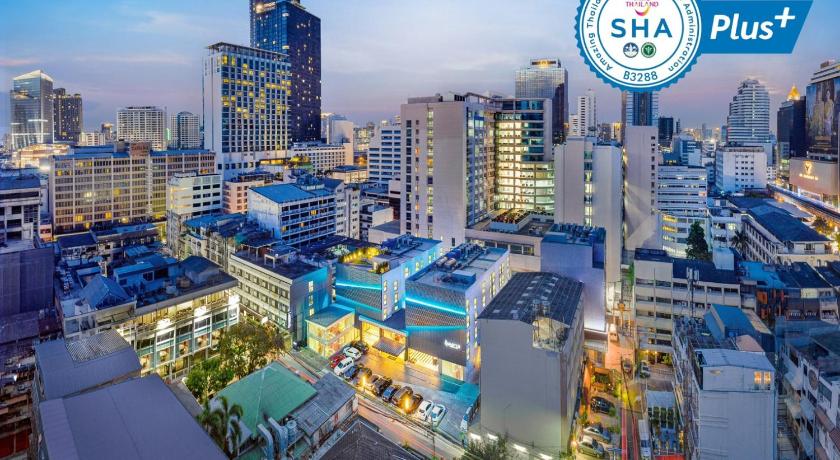 a city with a lot of tall buildings, The Quarter Silom by UHG (SHA Plus+) in Bangkok