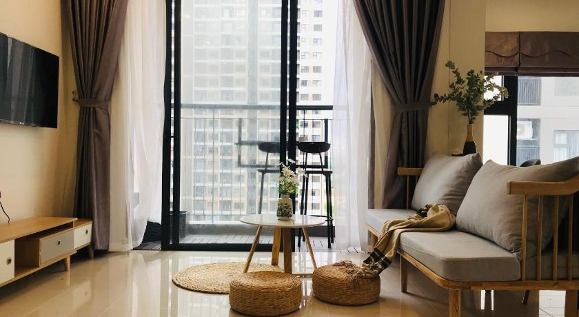a living room filled with furniture and a window, Daisy Homestay in Gia Lam
