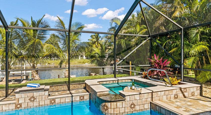 Direct Access Waterfront Villa with Heated Pool & Spa Edgewater Escape Roelens Vacations photo