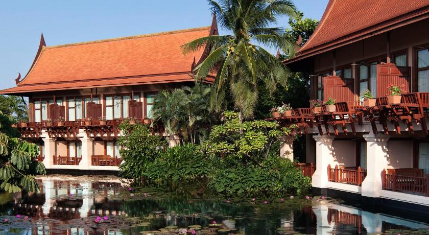 a large building with a large clock on the front of it, Anantara Hua Hin Resort  (SHA Extra Plus) in Hua Hin / Cha-am