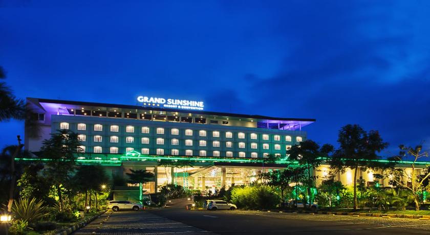 a large building with a clock on the front of it, Grand Sunshine Resort and Convention in Bandung