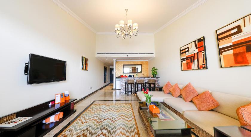 a living room filled with furniture and a tv, Movenpick Resort Al Nawras Jeddah - Family Resort in Jeddah