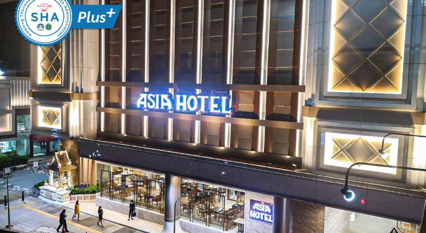 a building with a sign on the side of it, Asia Hotel Bangkok (SHA Plus+) in Bangkok