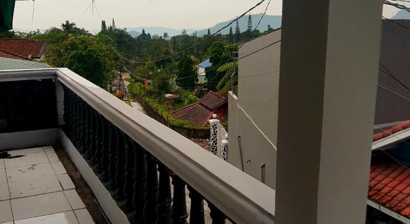 a view from a balcony of a building, Iyut Homestay in Puncak