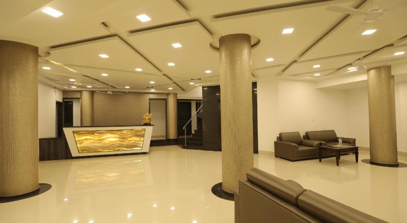 a large room with a lot of furniture in it, Imperial Grande in Lonavala