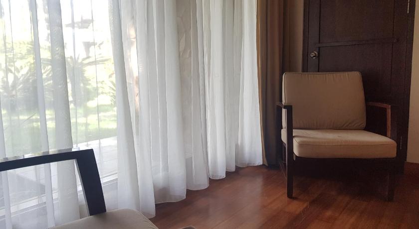 a living room filled with furniture and a window, Jiwa Jawa Resort Bromo in Bromo