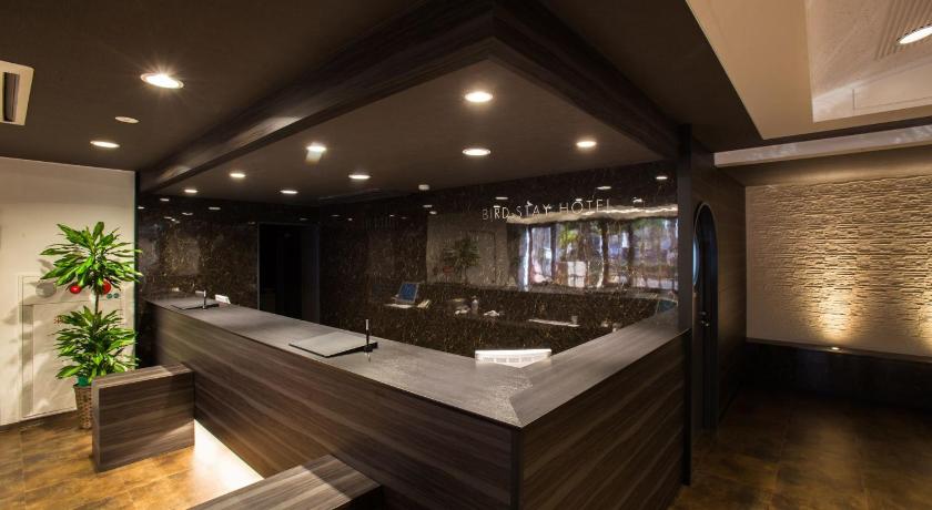 a bathroom with a large marble counter top, Bird Stay Hotel in Tottori
