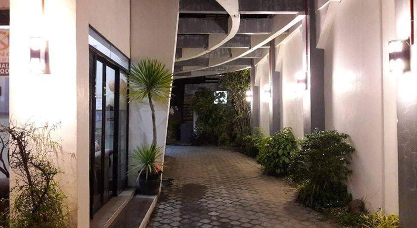 a very large building with a large window, Dolyn Suites in General Santos City