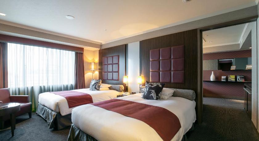 Bilde av Corner Suite Twin Room - Non-Smoking (2 Adults) 0