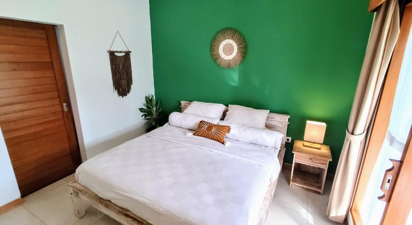 Tampilan PLAYA KARMA Guesthouse
