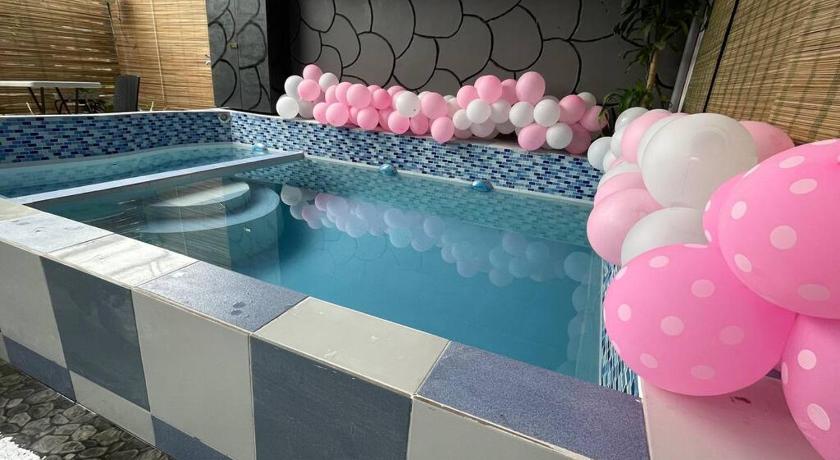 RS Escape in Deca Clark with Private Pool, 2BR, 1 Office, Netflix and 45MBPSWifi photo