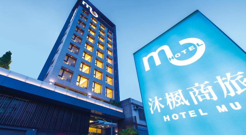 a blue and white building with a blue sky, Hotel Mu in Taoyuan