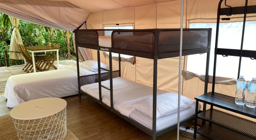 a bed room with two bunk beds in it, Canopy Villa Tampik Valley in Bentong