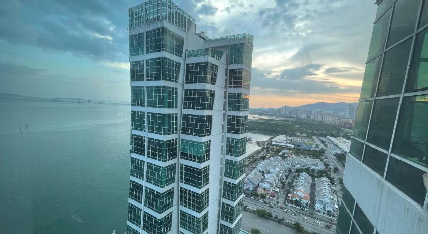 a large building with a view of the ocean, Maritime Seaview Hotel by SS Setia Resort in Penang