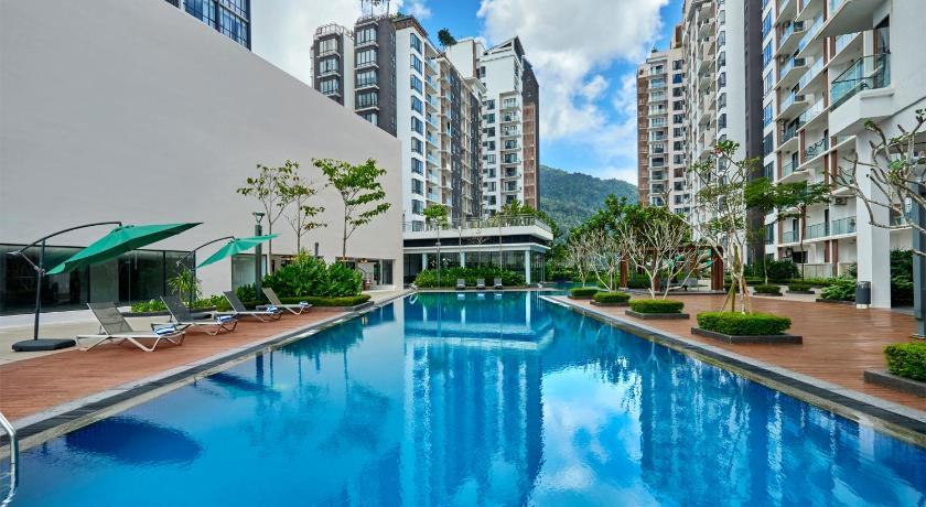a large swimming pool in front of a large building, Urban Loft@Midhill Genting Highlands (Free Wi-Fi) in Genting Highlands