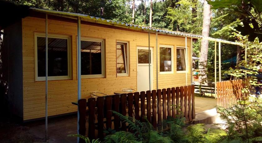 Ferienbungalow auf FKK Waldcampingplatz am See photo