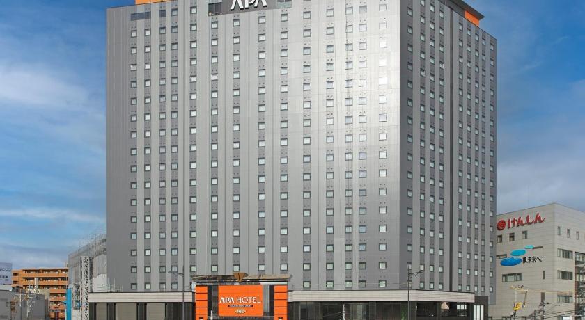 a large building with a large clock on the side of it, APA Hotel and Resort Niigata Ekimae Odori in Niigata