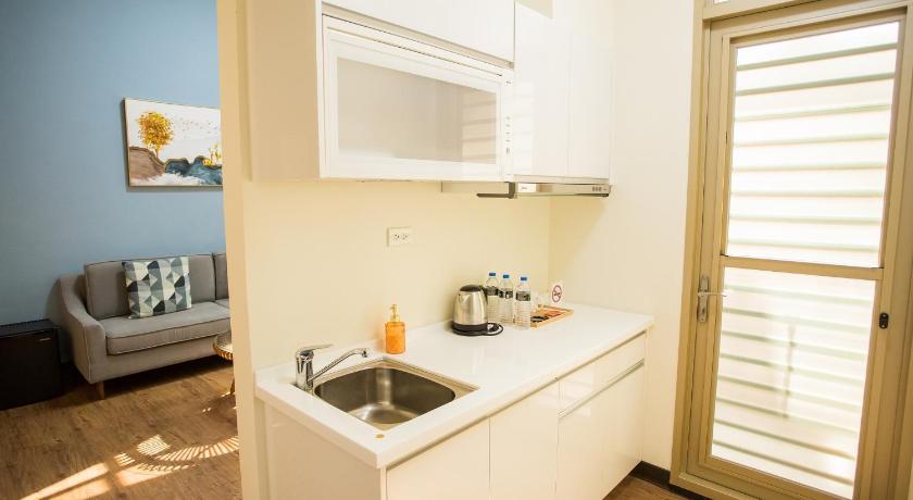 Image of 1-Bedroom Deluxe Suite with 2 Single Beds and Balcony 16