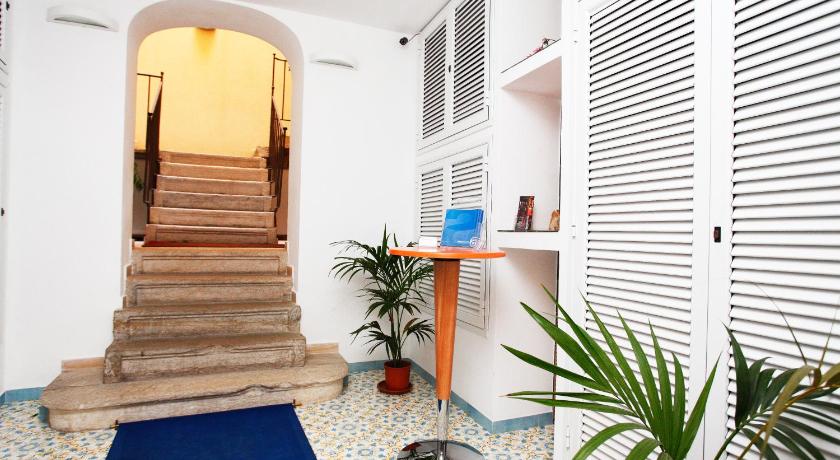 a room with a staircase leading to a hallway, Appartamenti Rosa Dei Venti in Trapani