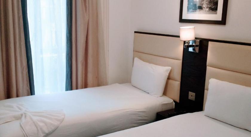 Immagine di Camera Doppia con Letti Separati (Twin Room) 1