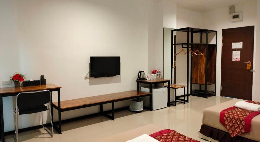 a living room with a couch and a table, P Bliss Hotel (SHA Extra Plus) in Phayao