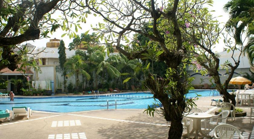 a beach with a pool and trees, Royal Twins Hotel (SHA Plus+) in Pattaya