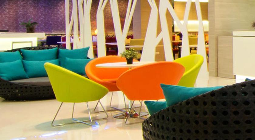 a living room filled with chairs and tables, The Stay Hotel (SHA Extra Plus) in Pattaya