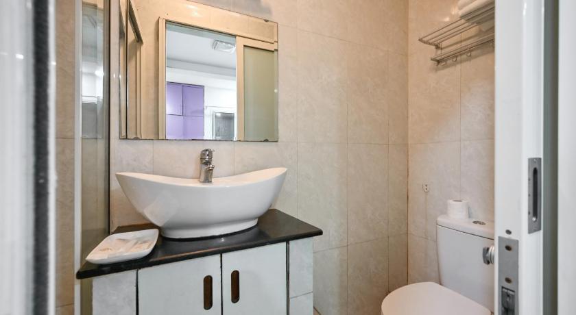 a bathroom with a sink, toilet and bathtub, 99 Bui Vien Hotel (Boutique) in Ho Chi Minh City