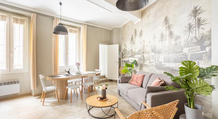 a living room filled with furniture and a large window, Best Stay 2 in Paris