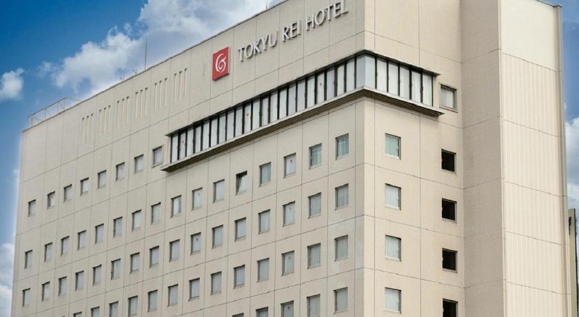 a large building with a large clock on it's side, Nagano Tokyu REI Hotel in Nagano