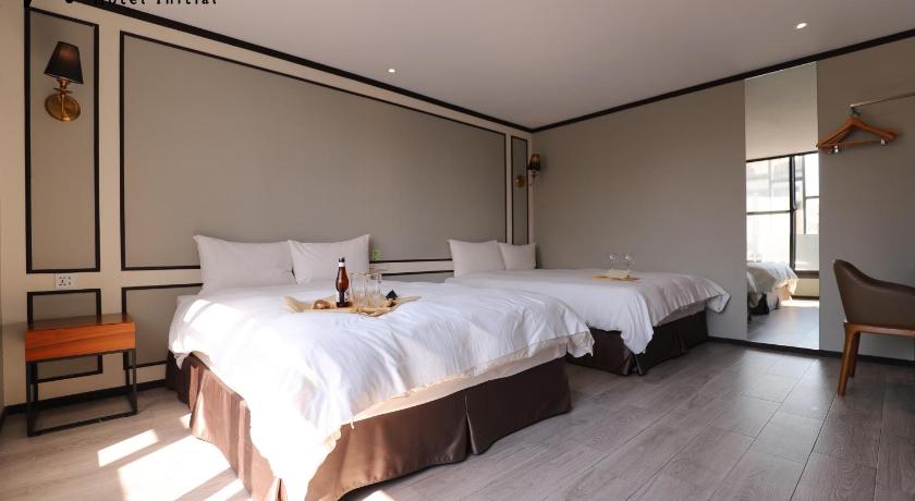 Image of Deluxe Quadruple Room with Balcony 2