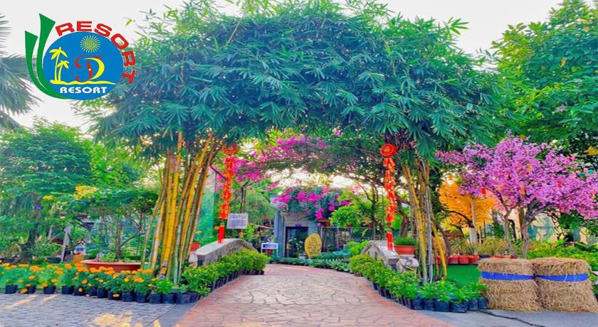 a garden filled with lots of flowers and plants, Thanh Dat Resort in Cần Thơ