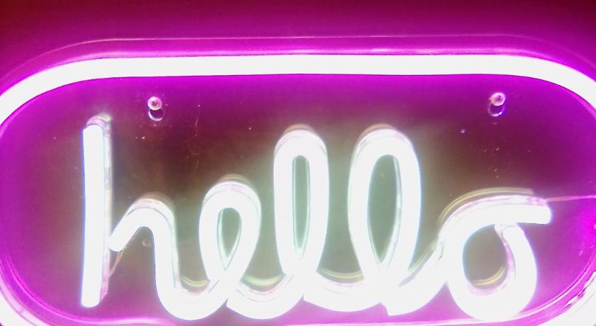 a neon sign on a neon sign post, The braeside families and couples in Blackpool