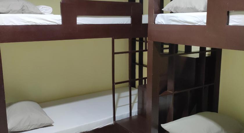 two bunk beds in a small room, Fiesta Ballroom Hotel in Legazpi