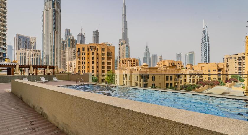 Bohemian Treasure 1BR, 5-min to Dubai Mall photo