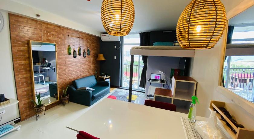 Spacious Condo w/ pool, FREE HIGHSPEED wifi and near Mactan Airport photo