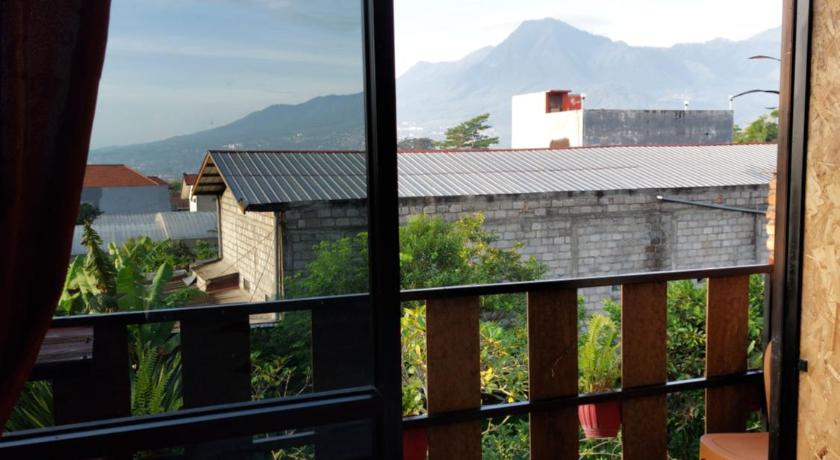 a view from a balcony of a house, Bliss family cottage Batu in Malang