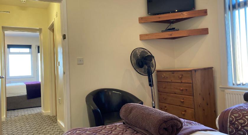 Image of Deluxe Sea View Two Bedroom Family Suite with Balcony 9