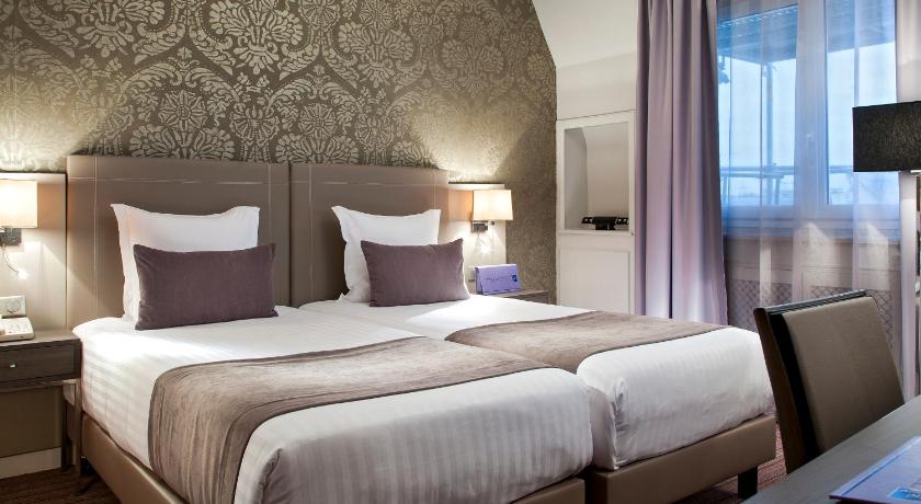 a hotel room with two beds and a large window, Timhotel Opera Blanche Fontaine in Paris